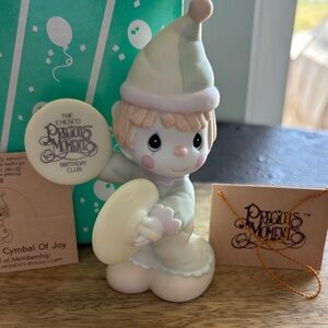 Precious Moments Figurine - “A Smile’s The Cymbal Of Joy”